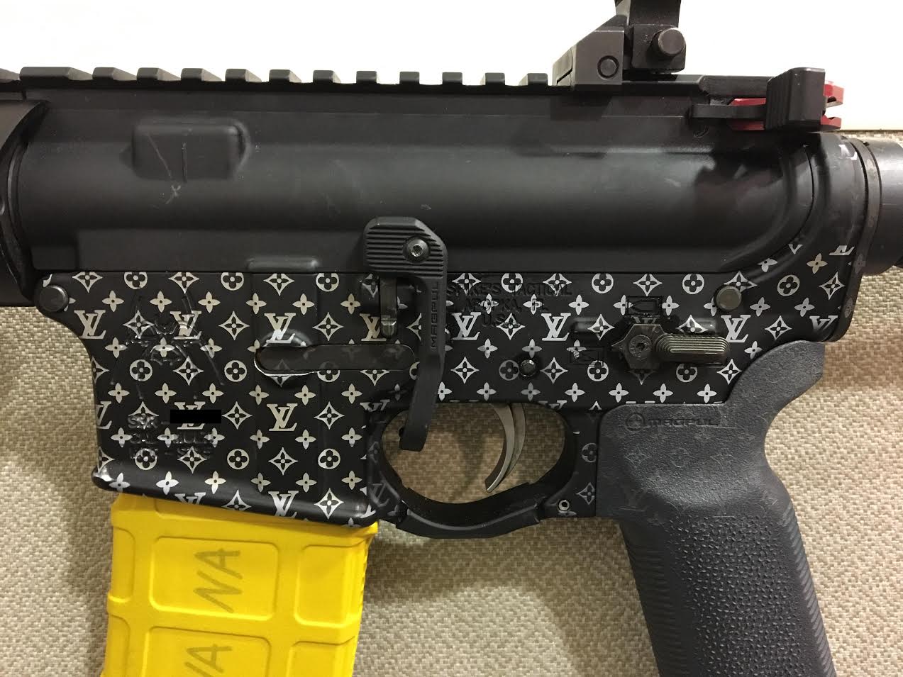 Larry Vuitton Print On The AR-15 With The Banana Clip